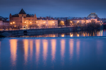 Prague old town and Vltava river illuminated at peaceful dawn, Czech Republic