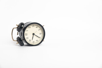 black vintage alarm clock isolated on white background, Time concept, 9:35 o'clock. Morning, reminder. waste time consept