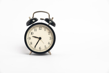 Obraz na płótnie Canvas black vintage alarm clock isolated on white background, Time concept, 9:35 o'clock. Morning, reminder.