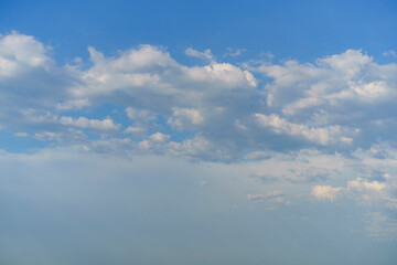 Natural background of blue sky with white clouds