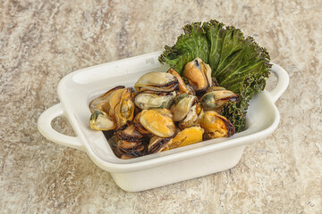 Tasty marinated mussels in the bowl