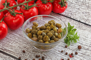 Marinated green capers in the bowl