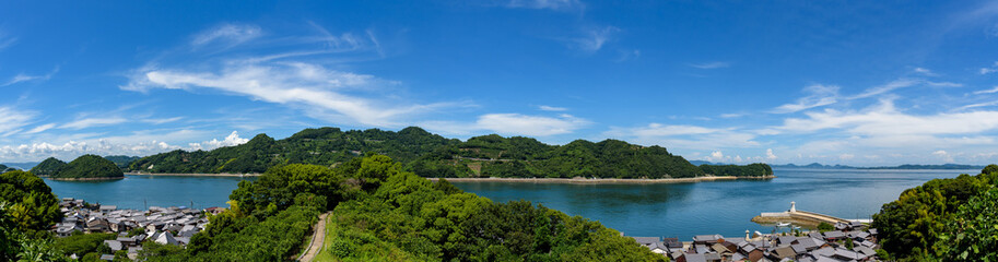 Fototapeta na wymiar Coastal scenery of Seto Inland Sea, Osakishimojima Island Mitarai Town and Okamura Island (Panorama)