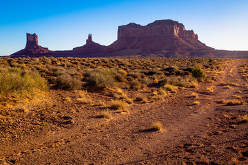 The Mittens, three buttes in Monument Valley at sunrise, Arizona and Utah, USA