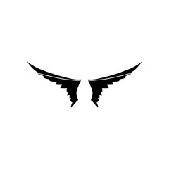 A pair of bird wings. Angel. Vector illustration for tattoo. Element for wood carving.