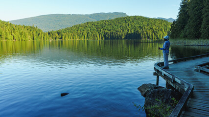 Sasamat Lake at Belcarra Regional Park, BC, in summer, as seen from the Sasamat Loop forest trail.