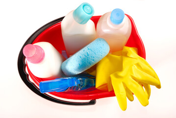 cleaning tools in a red bucket isolated