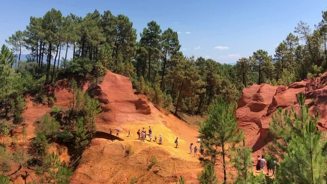 The Ochre Path le Sentier des Ocres through the Red Cliffs of Roussillon Les Ocres, a nature park in Vaucluse, Provence, France.	