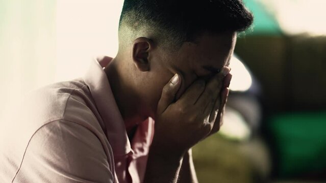 Dramatic desperate man crying from despair. Sorrow and lost concept