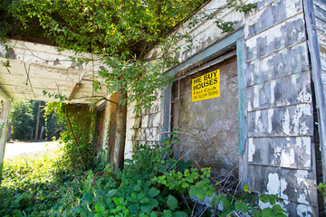 Buying house sign on a abadoned house