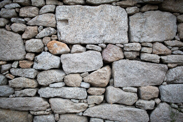 Textura de piedras de una fachada de una casa 