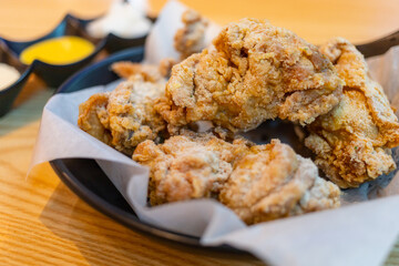 Fried crispy chicken strips in restaurant