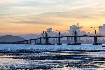 Kinmen Bridge under construction in Taiwan at sunset