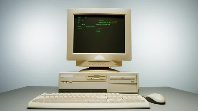 Retro pc with loading code console, programmer making scripts, green basic screen, Old computer studio close-up, Desktop vintage retro wave display, late 90s PC.