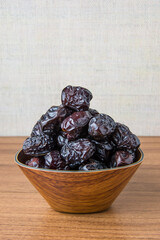 Delicious ajwa dates ( kurma nabi ), Much sought after during the month of Ramadan as a dish for breaking the fast, ramadhan kareem, empty space, copy space.