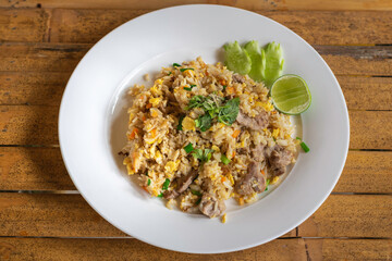 Thai pork fried rice in a white plate