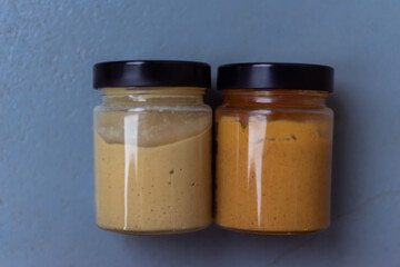 Peanut butter in а glass jar. Eco healthy vegan food concept