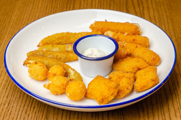 Nuggets with sauce in a plate