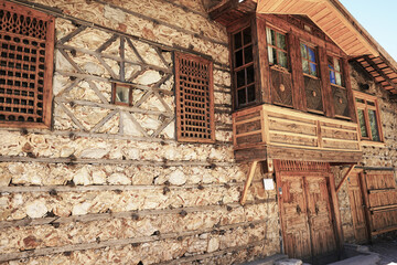 Fototapeta na wymiar Düğmeli Evler ( Buttoned houses ) with old the traditional architectural style of the Anatolian towns of İbradı and Ormana. Antalya – Turkey