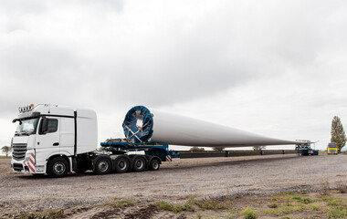Wind turbines under construction. Transport of a Blade for wind turbines. Special transport of a...