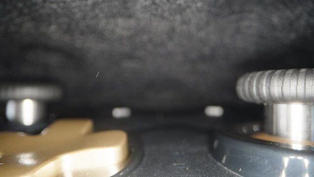 Black joystick from a game console in a case. Dolly slider extreme close-up.