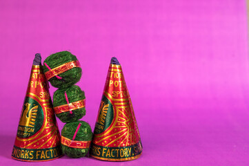 Stack of fire crackers with sweets for Diwali celebration