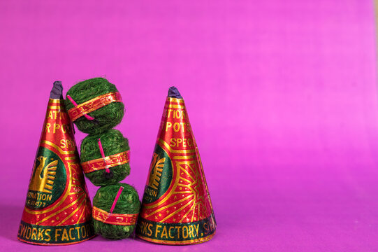 Stack of fire crackers with sweets for Diwali celebration
