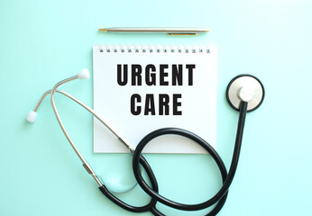 White notepad with the words URGENT CARE and a stethoscope on a blue background.