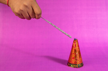 Stack of fire crackers with sweets for Diwali celebration