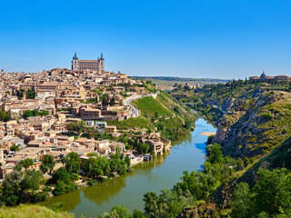 Fototapeta na wymiar Panoramic view of Toledo with Tagus river and the Alcazar seen from the viewpoint Mirador del Valle. Castilla La Mancha, Spain, Europe