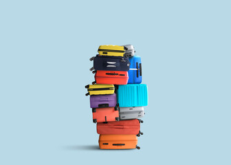 Tourist suitcases stacked on top of each other in a pile. Travel concept.
