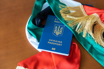 passport of Ukraine, flag of Ukraine and UAE