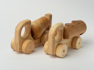 Wooden toy car on a white background