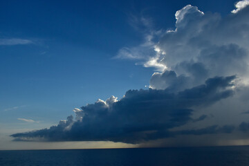 Rainstorm at sunrise off the Florida coast