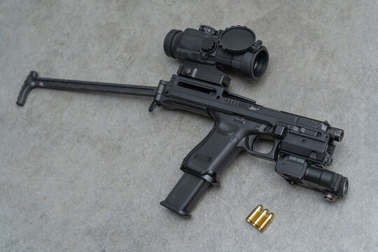Conversion kit for a pistol with a mounted sight and laser.