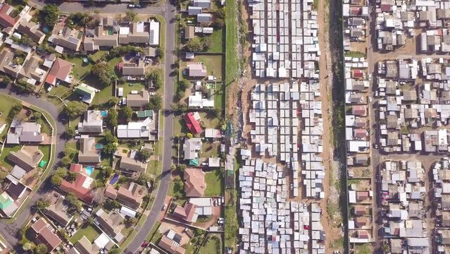 Aerial of township and wealthy houses in South Africa, inequality