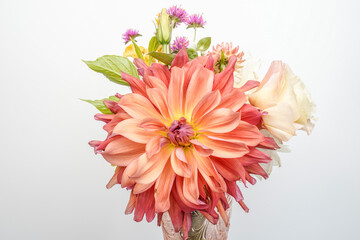 Beautiful floral arrangement, white background. Dahlia, celosia, lisianthus and snapdragon flowers....