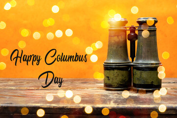 Columbus Day Concept. Vintage military old binocular on wood table, Discovery Equipment