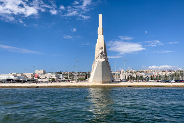 View from a tour boat over the Monument of the discoveries in Lisbon