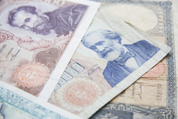 Italian banknotes full background. Old national currency of Italy. Vintage banknotes, paper lire.
