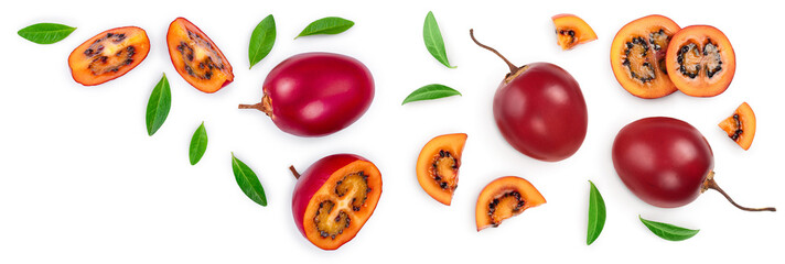 Fresh tamarillo fruit with leaves isolated on white background with copy space for your text. Top view. Flat lay