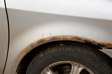 Rust on the fender of the car.An old car and rust on the car.