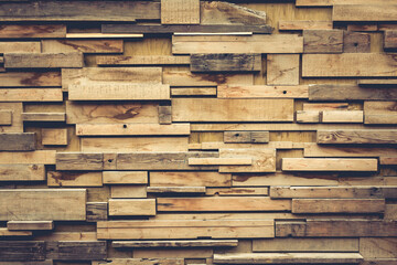 Layers of wood and plank boards as a wall