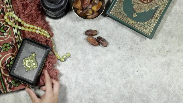 Ornamental black rosary, prayer mat Ramadan Kareem Greeting Card. Ramadan Mubarak. Translated: Happy and Holy Ramadan. Month of fasting for Muslim