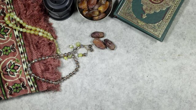 Ornamental black rosary, prayer mat Ramadan Kareem Greeting Card. Ramadan Mubarak. Translated: Happy and Holy Ramadan. Month of fasting for Muslim