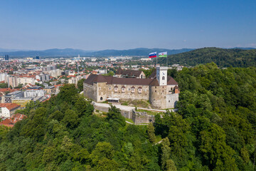 Fototapeta na wymiar Ljubljana Castle and old town in Slovenia. Ljubljana is the largest city. It's known for its university population and green spaces, including expansive Tivoli Park. The curving Ljubljanica River