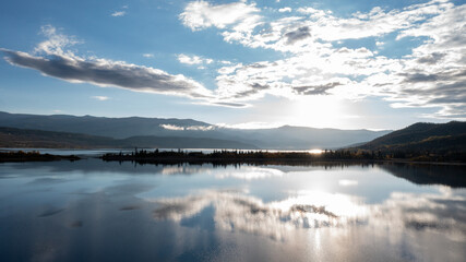 High Mountain lake at sunrise with reflection