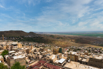 Mardin old town architecture with view of Mesopotamia Plain towards Syria. 