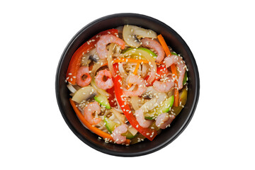 Noodles wok, with vegetables, herbs and sesame. In a black round plate. On a white background.