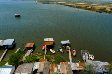 Fototapeta na wymiar The fishing settlement at the mouth of the river Loudia in Greece